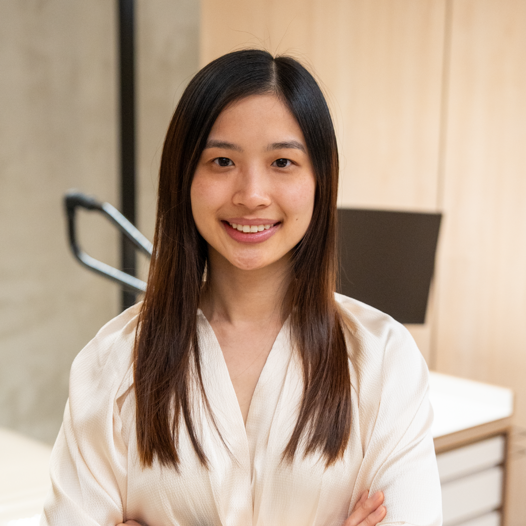 Orthodontist, Dr Laura Truong, of Medland Orthodontics smiling warmly towards the camera at the new Upper Coomera practice, located at 2/15 City Centre Drive, Upper Coomera QLD 4209.